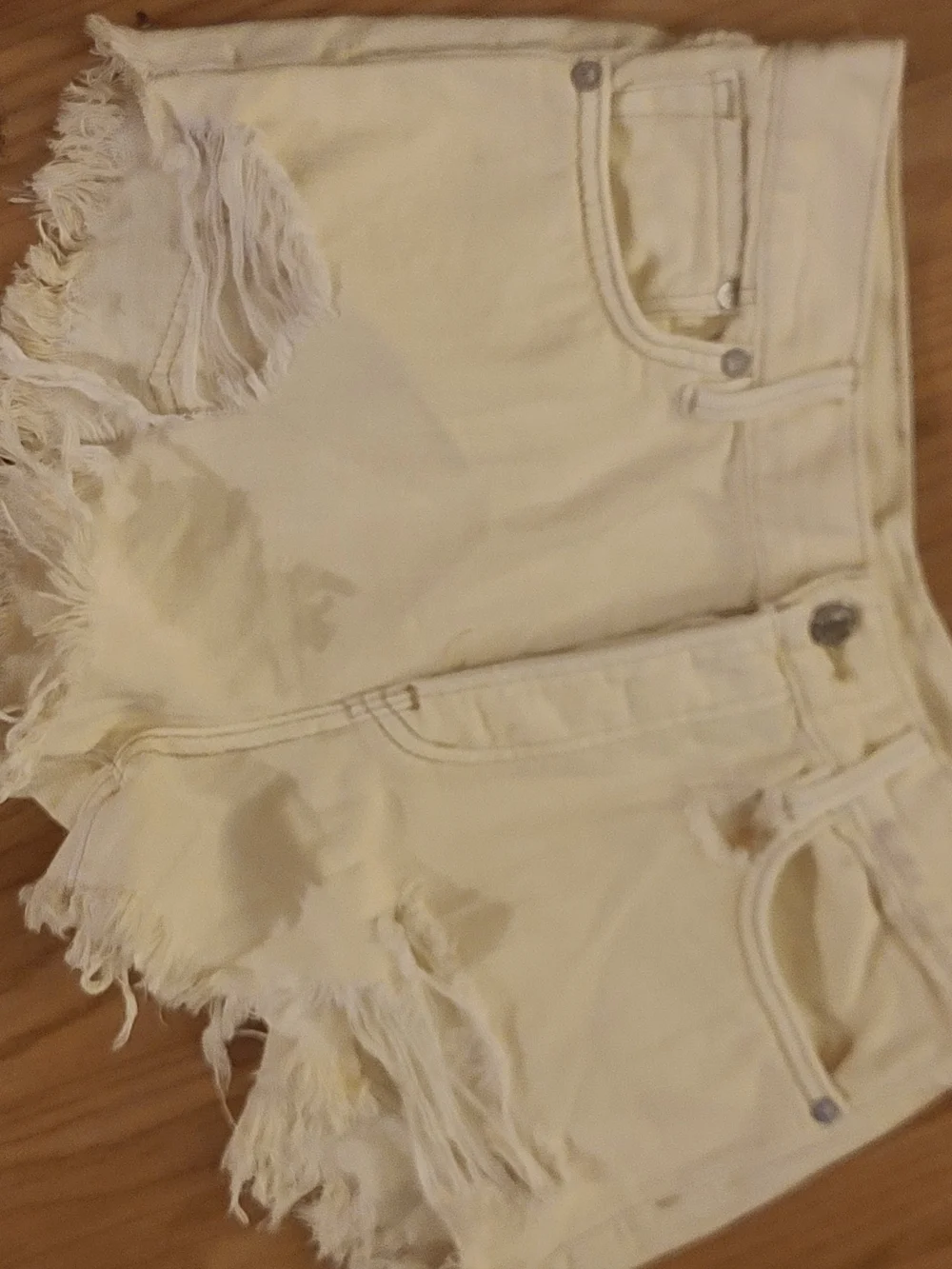 Free People Cream Distressed Denim Cutoff Shorts